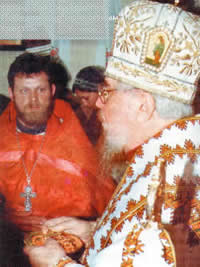 The Most Reverend Father in God Nikodim rewards the senior priest of the church of the Great Martyr St. George the Victory-Bearer with a pectoral crucifixion.